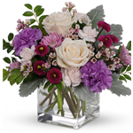 Swirling with bands of soft lavender, this sweet cube arrangement makes a marvelous Mother's Day gift, filled with creamy roses