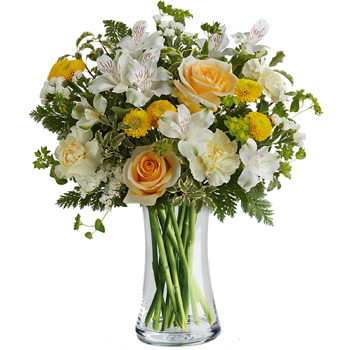 Clear tall glass vase arrangement of yellow roses, carnations & button spray chrysanthemums, white alstroemeria & statice, accen