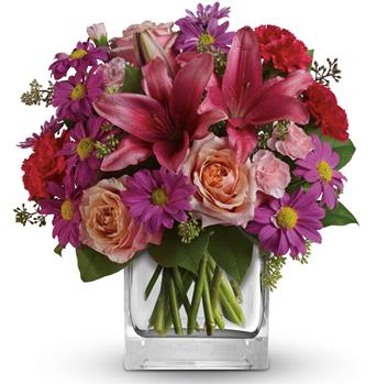 - Take a wondrous walk through this enchanted garden of peach roses, pink lilies and purple daisies.