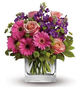 - Like the dawn of a fine spring day, this pretty pink gift of gerberas, roses and delicate blue delphinium promises happiness!