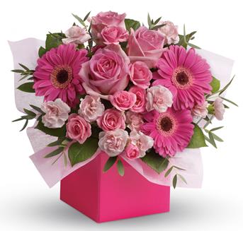 Looking to pamper someone special? Think pink! Hot pink  gerbera mix with soft pink roses and mini carnations in this fabulously