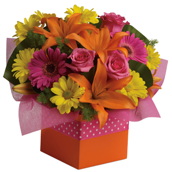 Joyful moments call for happy flowers! This box of blooms does the trick  with a teddy.