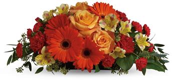 A sweet treat everyone will enjoy! Delight your special someone with this outstanding orange arrangement of gerberas, roses and