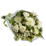 Simply stylish bouquet of all whites accented with seasonal greens