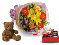 A burst of brilliant flowers designed to make their spirits soar! with choc & teddy