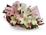 - Stunning in its simplicity, this innocent harmony of light pink roses and snow white lilies are a heartfelt way to send your v