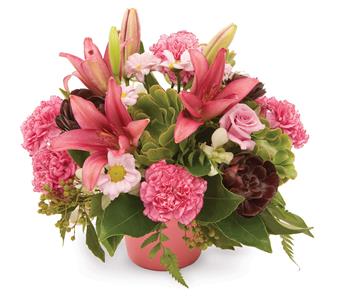- Modern arrangement of lilies, chrysanthemums and carnations add a touch of something different.