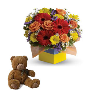 You will want to put this colourful arrangement with teddy.