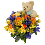 A fun spring bouquet with cuddly soft toy. Vase not included unless otherwise stated
