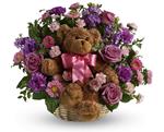 - Welcome the new bundle of joy to the family with this basket arrangement of lavender and pink blooms and a delightful bear.