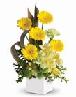 - Send smiles across the miles. This artful arrangement of sunny yellow blooms in a modern pot is specially designed to warm hea