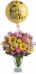 - Dazzle someone on their special day with a stunnning vase arrangement. Delightful blossoms and balloon are sure to make their