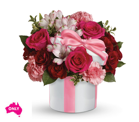 A sweet chic mix arranged in a ceramic hat box
