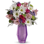 A great way to make someone smile - a delightful mix arranged in a lavender Beauty vase