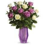 Make Mums day with a dozen delightful cream and lavender roses! Hand-delivered with love in a Beauty keepsake vase shell adore