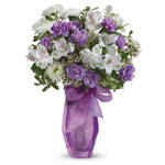 Fill her heart with laughter! The ultimate lavender-lovers bouquet, this gleeful gift of white and lavender blooms is delivered