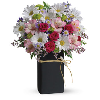 Fresh spring flowers in a delightful ceramic Chalk It keepsake vase, thats actually a chalkboard (with real chalk).