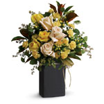 Send this cheerful gift of yellow and cream blooms, accented with greenery and arranged in a ceramic Chalk It keepsake vase, tha