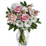 A sweet, simple statement of your sincere love - arranged in a lovely glass vase