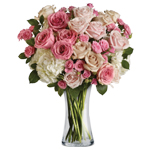 Roses and hydrangea delivered in a beautiful glass vase