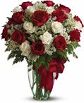 Loves divine, and roses are too. This beautiful vase arrangement of red and white roses is a timeless gift for your beloved