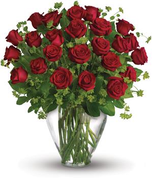 When it comes to delivering romance in a big way, two dozen gorgeous red roses hand arranged in a glass vase, are a brilliant ch
