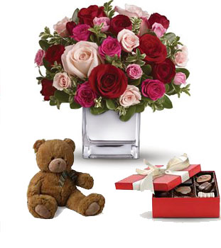 Their heart will break into song when this romantic cube of ravishing roses arrive with a box of chocolates and a teddy.