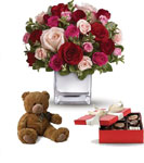 Their heart will break into song when this romantic cube of ravishing roses arrive with a box of chocolates and a teddy.