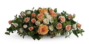 Set the scene for romance with this lavish table arrangement of peach, pink and cream roses. Beautiful on an entry table, too!