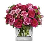 This exquisite arrangement of light pink and hot pink roses, is a gift that will long be remembered