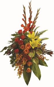 - A graceful modern funeral spray of warm colours, it includes flowers such as anthurium, roses and tropical greenery.