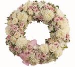 - A breathtaking expression of love and devotion, this lovely wreath of soft pastel blossoms will soothe, while its extraordinar