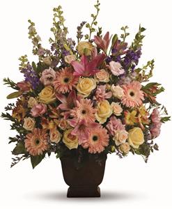 - A warm and peaceful bounty of pastel blossoms gently expresses love and respect. A gracefully composed arrangement appropriate