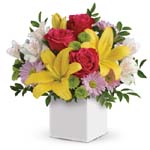 Looking to delight someone special? This cute, colourful gift of sunshiny lilies and pretty pink roses is the perfect gift!