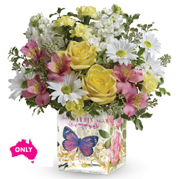 Celebrate with this delightful gift. A cheery arrangement that will delight in an Enchanted glass cube