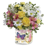 Celebrate with this delightful gift. A cheery arrangement that will delight in an Enchanted glass cube